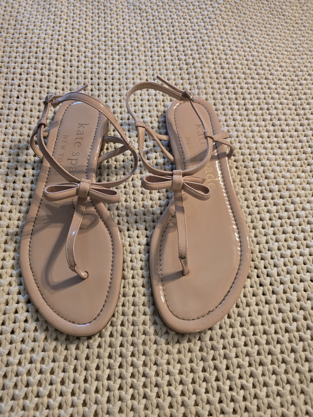 kate spade Patent Bow T-Strap Sandals in Blush